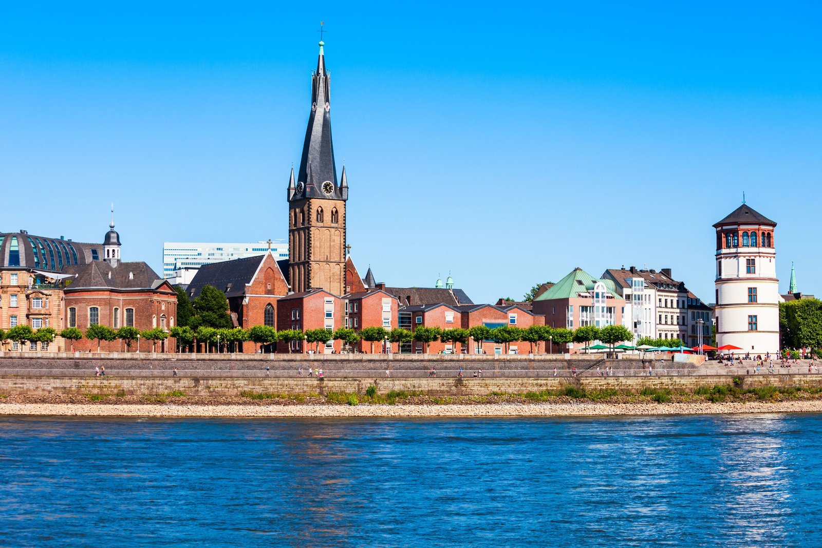 Aldstadt old town in Dusseldorf St. Lambertus Church and Schlossturm castle tower in aldstadt old town of Dusseldorf city in Germany